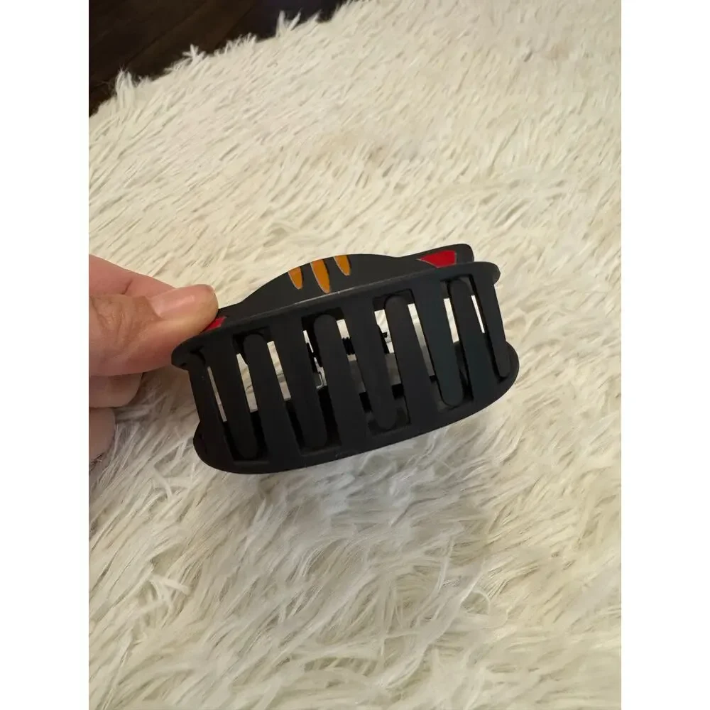 Large Black cat hair clip claw with white whiskers, red nose, and pink mouth